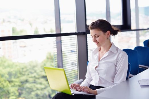 business woman  with her staff,  people group in background at modern bright office indoors