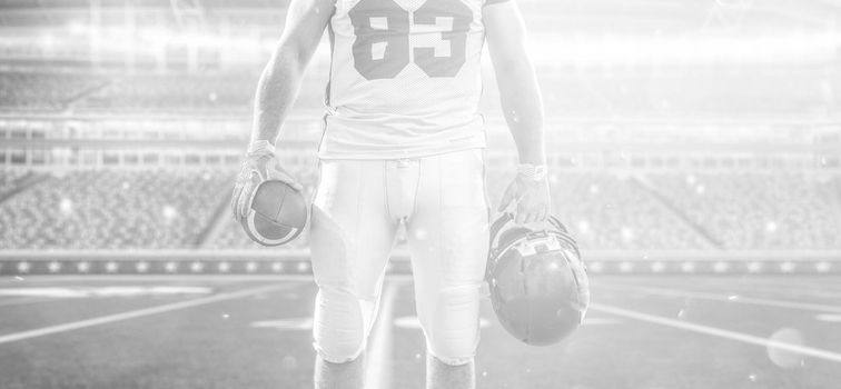 Closeup Portrait of a strong muscular American Football Player on big modern stadium field with lights and flares