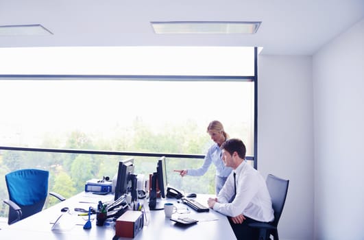 Group of happy young  business people in a meeting at office