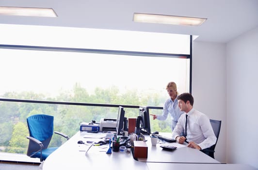 Group of happy young  business people in a meeting at office