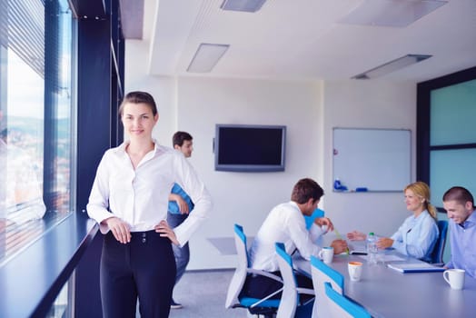 Group of happy young  business people in a meeting at office