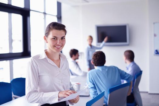 Group of happy young  business people in a meeting at office