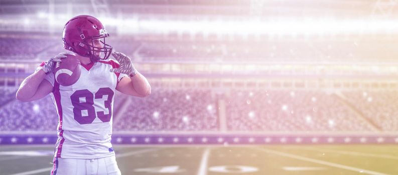 one quarterback american football player throwing ball on big modern stadium field with lights and flares