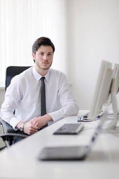 Portrait of a handsome young business man  at office meeting