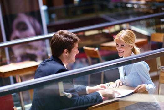 Group of happy young  business people in a meeting at office