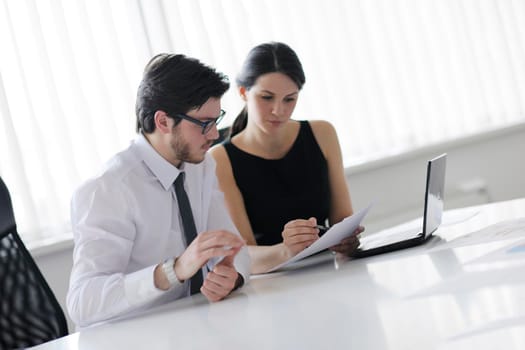 Group of happy young  business people in a meeting at office