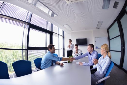 business people shaking hands make deal and sign contract