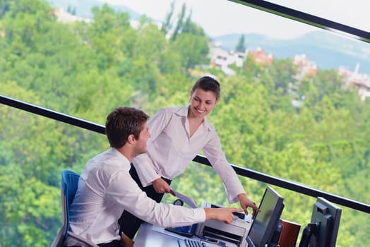 Group of happy young  business people in a meeting at office