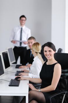 business people group with  headphones giving support in  help desk office to customers, manager giving training and education instructions