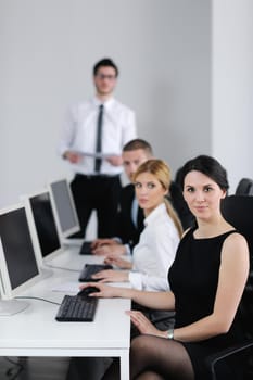 business people group with  headphones giving support in  help desk office to customers, manager giving training and education instructions