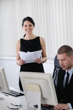 Group of happy young  business people in a meeting at office