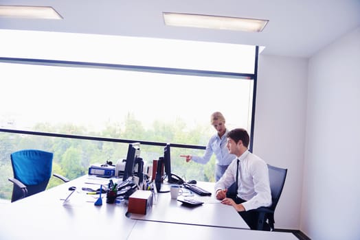 Group of happy young  business people in a meeting at office