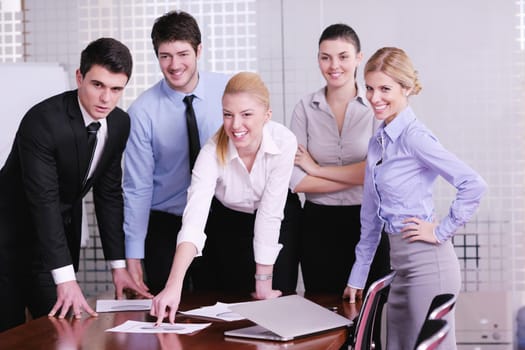 Group of happy young  business people in a meeting at office