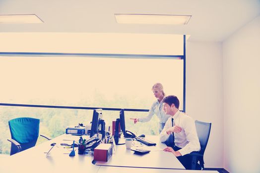 Group of happy young  business people in a meeting at office