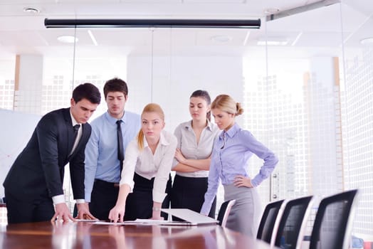 Group of happy young  business people in a meeting at office