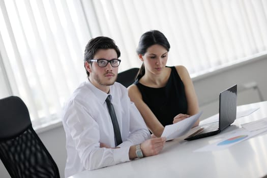 Group of happy young  business people in a meeting at office