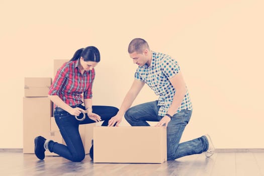 happy Young couple moving in new home