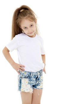 A charming little girl in short shorts and a pure white T-shirt on which you can make any inscription. The concept of advertising, including children's products. Close-up. Isolated on white background.