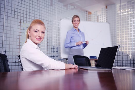 Group of happy young  business people in a meeting at office