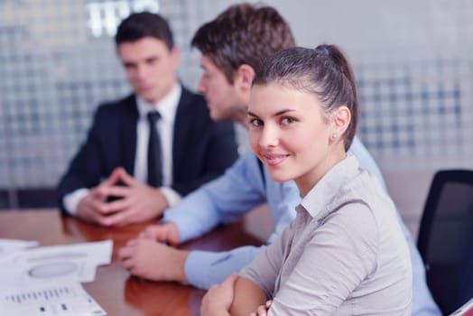 Group of happy young  business people in a meeting at office