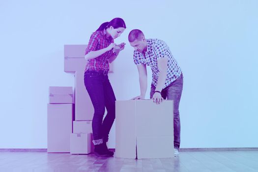 happy Young couple moving in new house