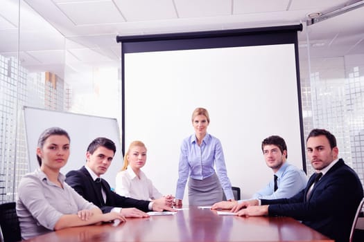 Group of happy young  business people in a meeting at office