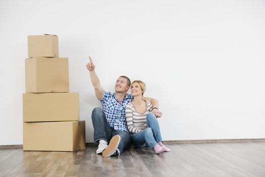 happy Young couple moving in new home