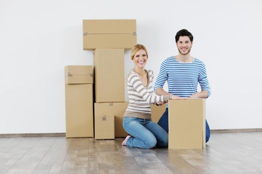 happy Young couple moving in new house