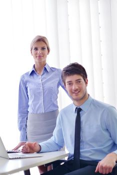 Group of happy young  business people in a meeting at office