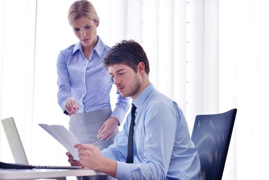 Group of happy young  business people in a meeting at office