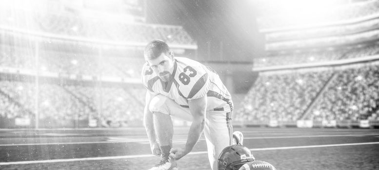 American Football Player preparing for match on big modern stadium field with lights and flares