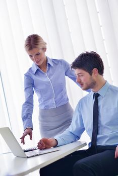 Group of happy young  business people in a meeting at office