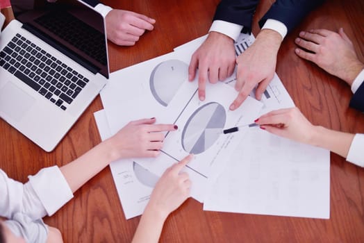 Group of happy young  business people in a meeting at office