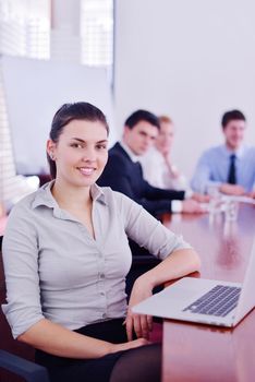 Group of happy young  business people in a meeting at office