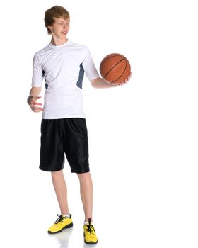 A young red-haired guy playing basketball. The concept of sport, fitness, healthy lifestyle. Isolated on white background.