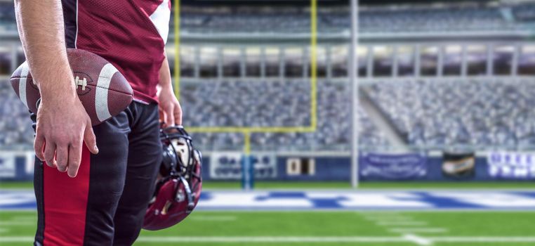 Closeup Portrait of a strong muscular American Football Player on big modern stadium field with lights and flares