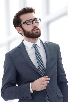 smiling businessman on the background of the office.business people