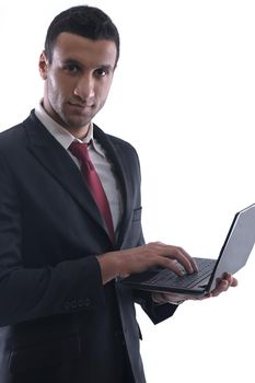 Smiling business man hold and work on mini laptop comuter   Isolated on white background in studio