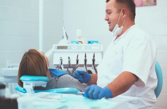 Doctor and patient in the dental clinic.