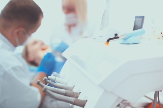 Different dental instruments and tools in a dentists office.