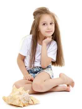 A little girl with a sea shell. The concept of a family vacation at sea, ecology. Isolated on white background.