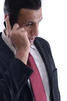 Portrait of a business man talk with cell mobile  phone isolated on white background. Studio shot communication concept