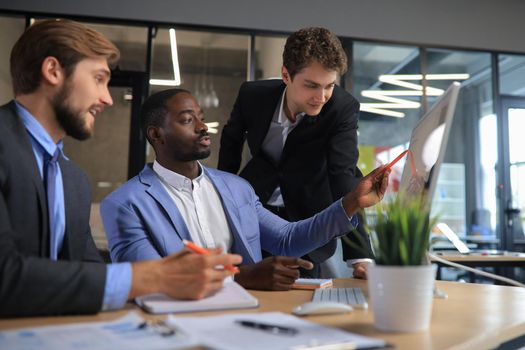 Group of business people in a meeting discussing and planning a project