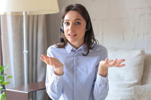 Freelance business women using tablet working call video conference with customer in workplace at home
