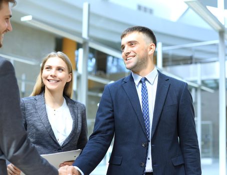 Business people shaking hands, finishing up a meeting