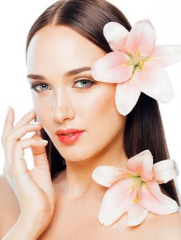 young attractive lady close up with hands on face isolated flower lily brunette spa nude makeup macro