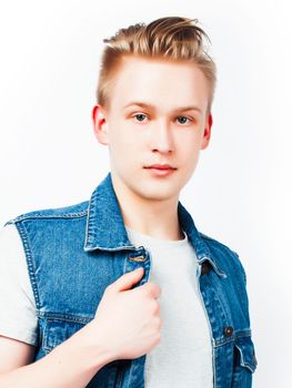 young handsome teenage hipster guy posing emotional, happy smiling against white background isolated, lifestyle people concept close up