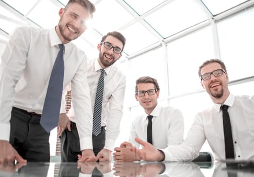 professional business team standing near the desktop.the concept of teamwork