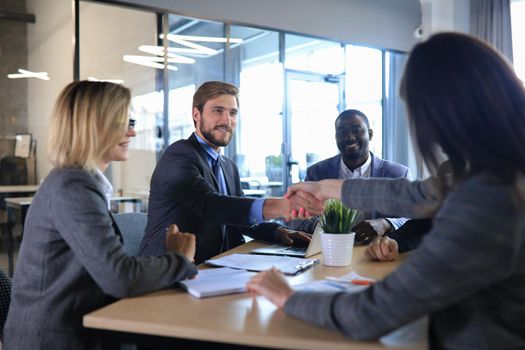 Job applicant having interview. Handshake while job interviewing