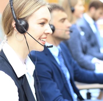 Female customer support operator with headset and smiling